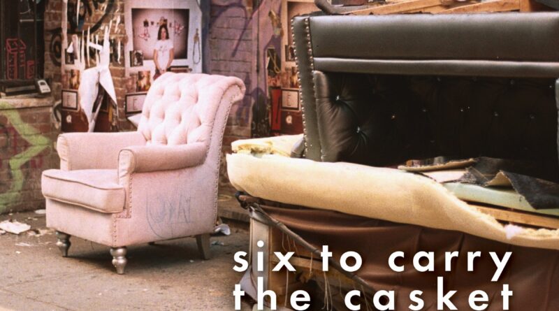 Book cover of Six to Carry the Casket and One to Say the Mass by Bill Hulseman, featuring an urban street scene with abandoned furniture, graffiti, and layered posters.